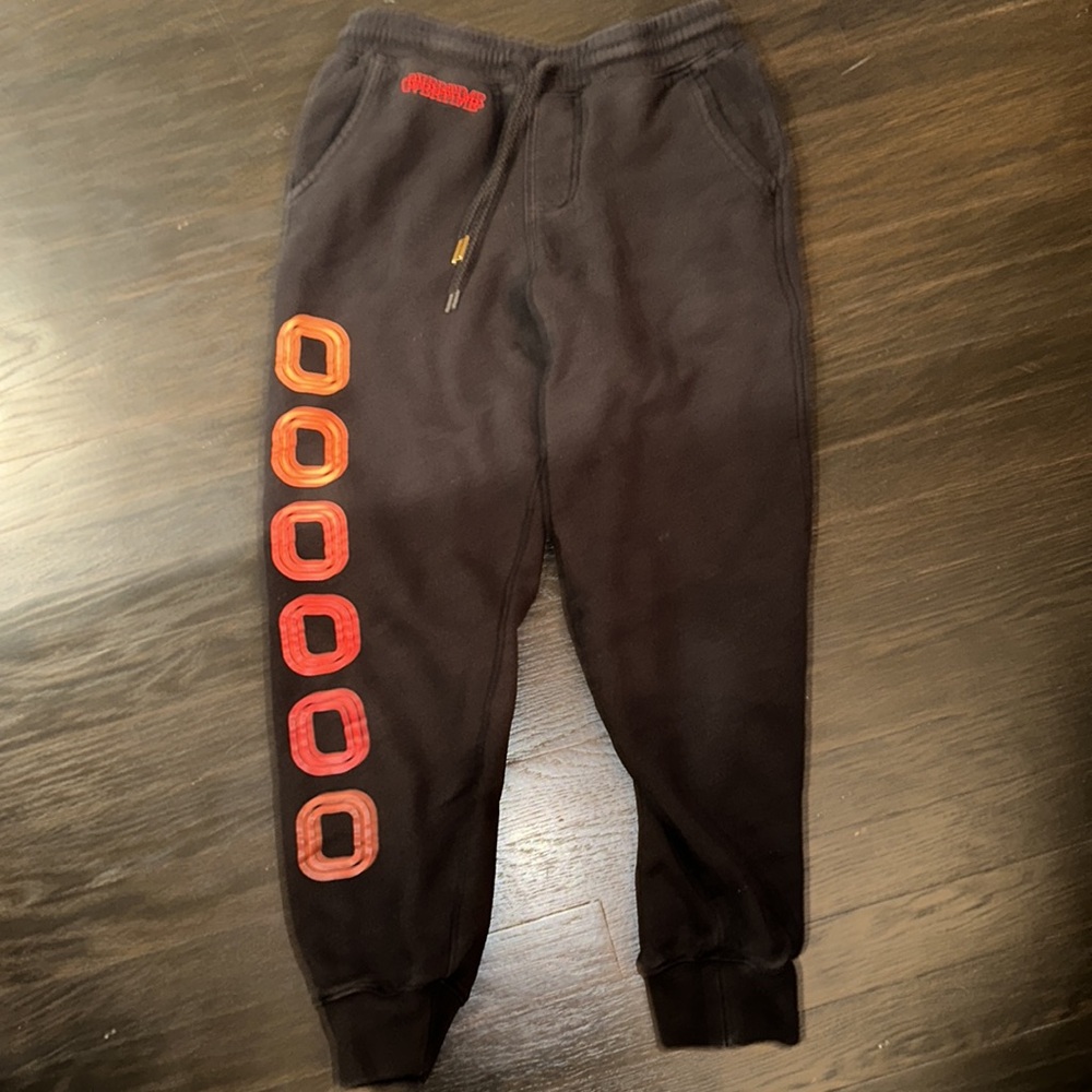 Overtime men’s small black jogger with orange Os